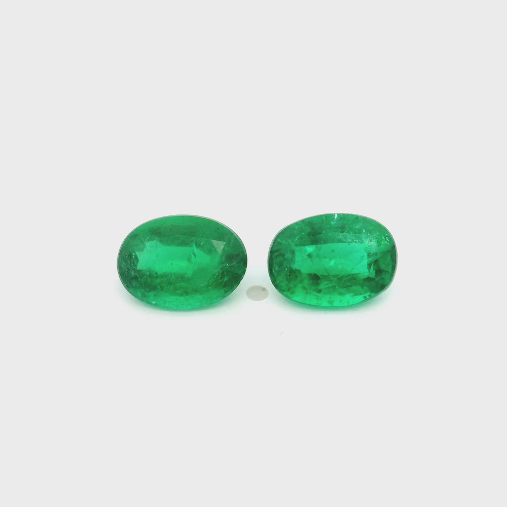 
                  
                    Load and play video in Gallery viewer, 9.00x6.55x0.00mm Oval Emerald (2 pc 3.49 ct)
                  
                