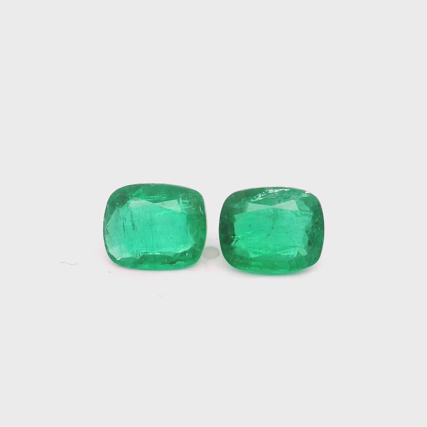 
                  
                    Load and play video in Gallery viewer, 8.55x7.04x3.73mm Cushion Emerald (2 pc 3.24 ct)
                  
                