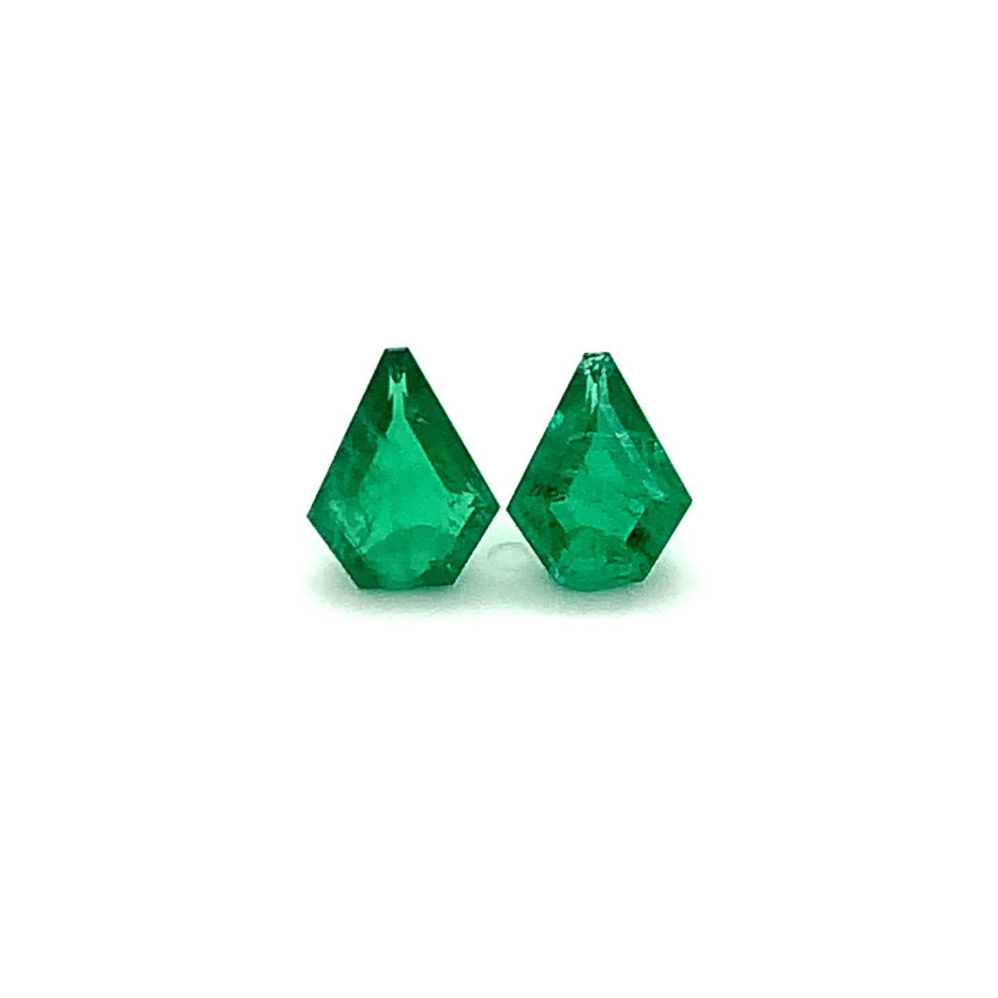 
                  
                    Load and play video in Gallery viewer, 9.00x7.20x0.00mm Fancy Cut Emerald (2 pc 2.55 ct)
                  
                