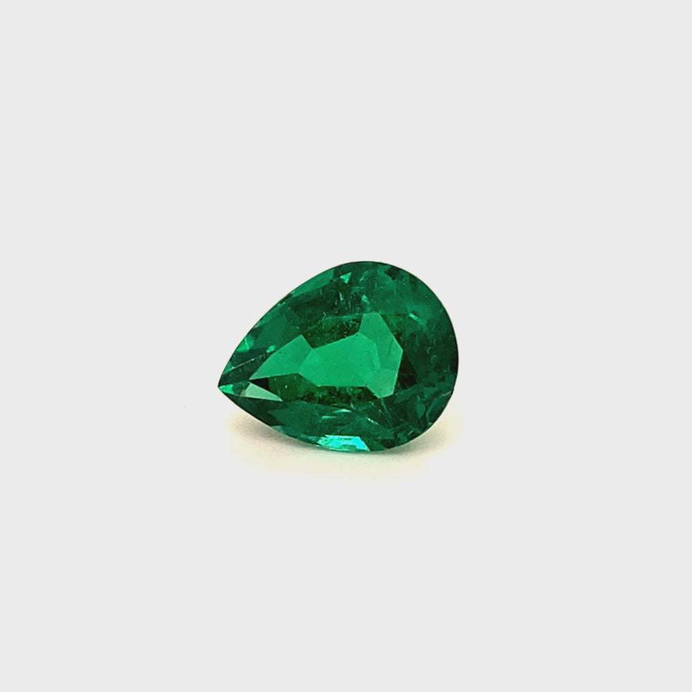 
                  
                    Load and play video in Gallery viewer, 14.67x11.29x7.85mm Pear-shaped Emerald (1 pc 7.13 ct)
                  
                