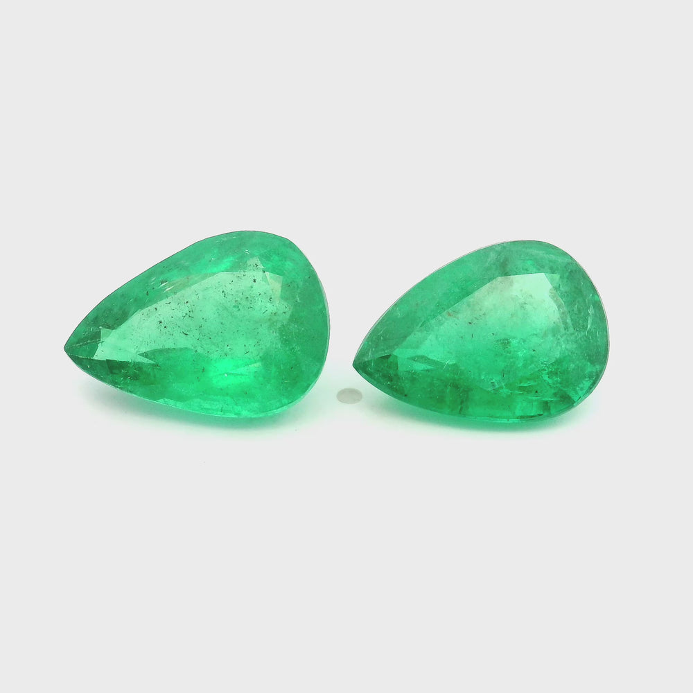 
                  
                    Load and play video in Gallery viewer, 16.00x11.40x0.00mm Pear-shaped Emerald (2 pc 14.55 ct)
                  
                