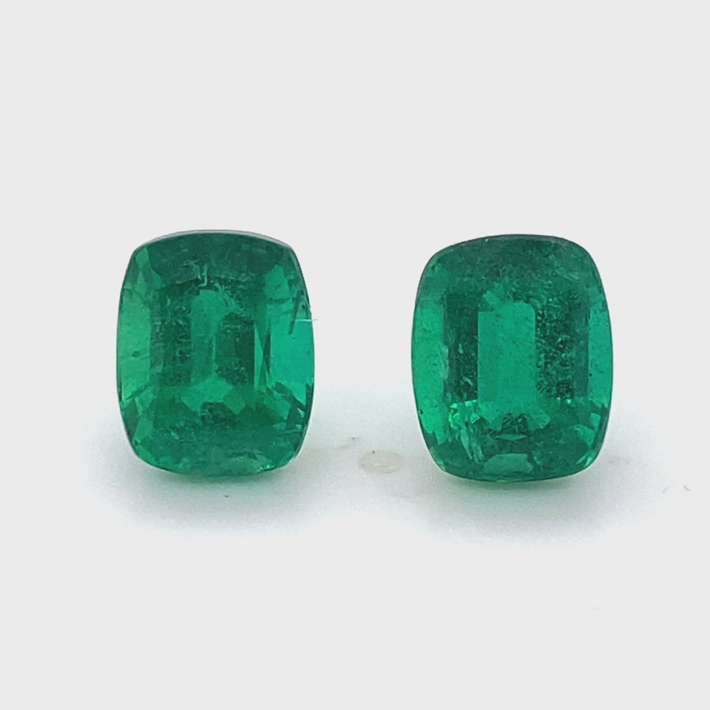 
                  
                    Load and play video in Gallery viewer, 10.54x8.59x6.10mm Cushion Emerald (2 pc 7.83 ct)
                  
                
