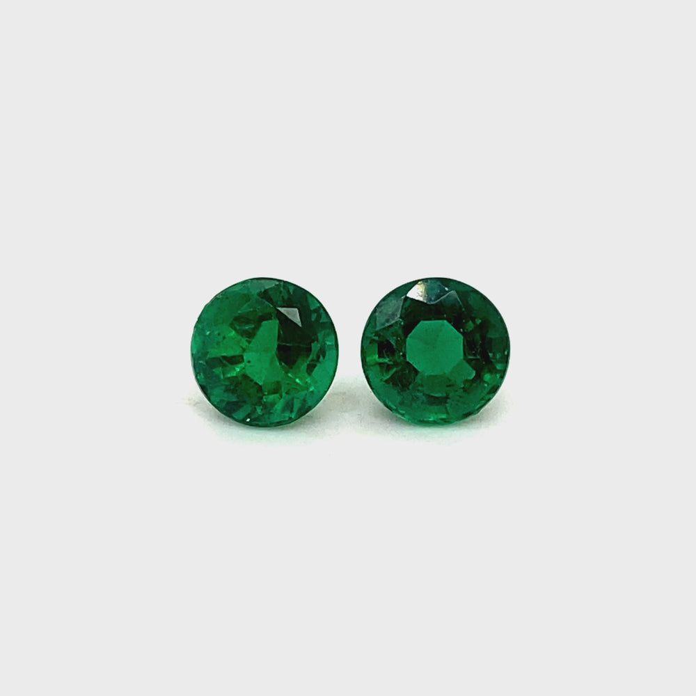 
                  
                    Load and play video in Gallery viewer, 7.62x7.67x5.68mm Round Emerald Pair (2 pc 3.63 ct)
                  
                