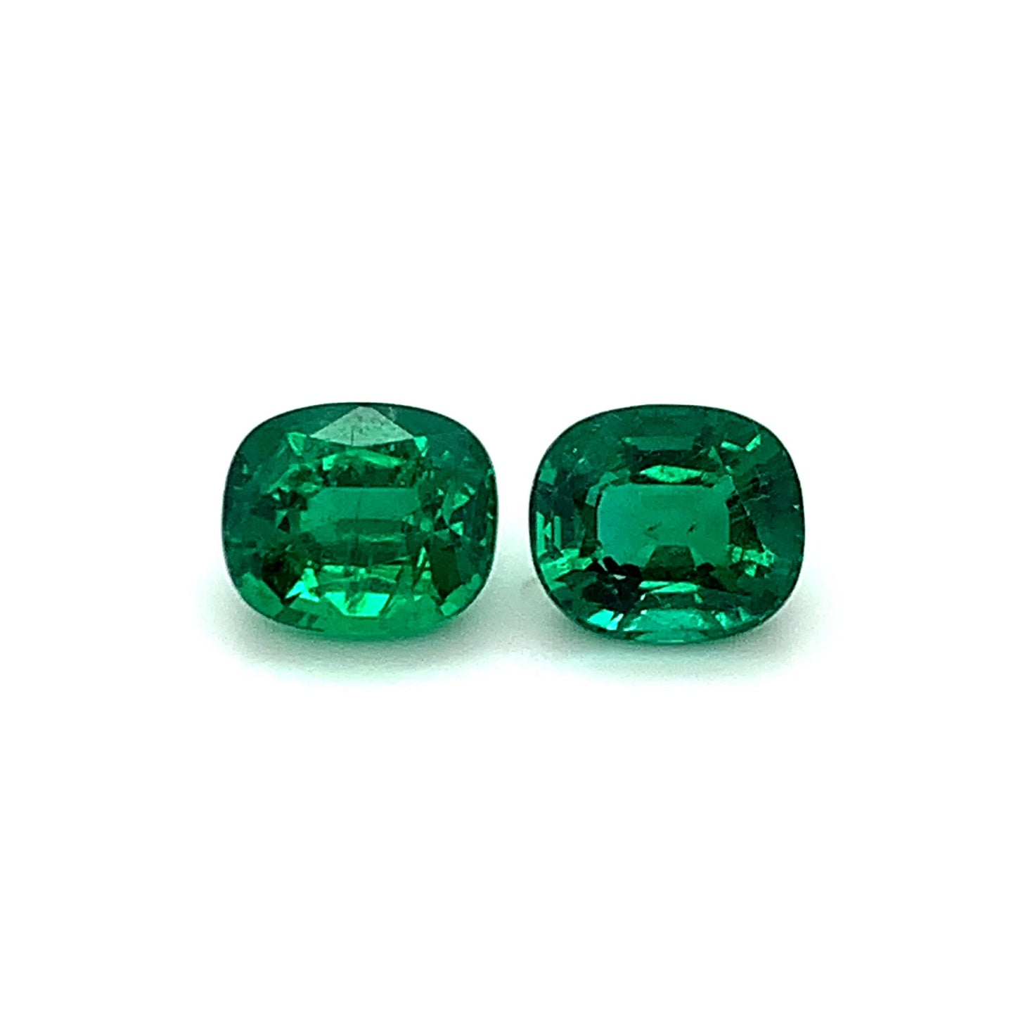 
                  
                    Load and play video in Gallery viewer, 10.79x9.28x7.09mm Cushion Emerald Pair (2 pc 8.64 ct)
                  
                