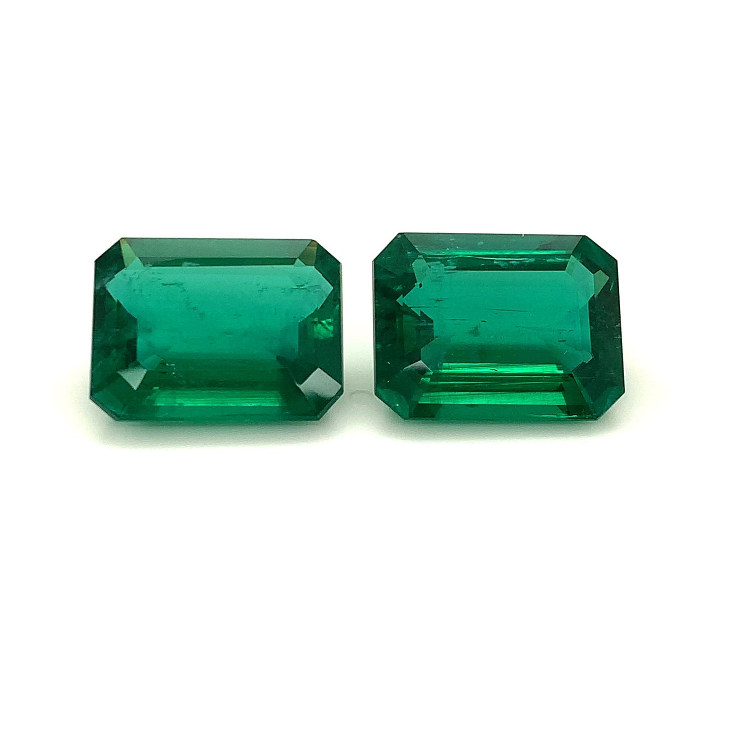 
                  
                    Load and play video in Gallery viewer, 20.08x15.40x8.46mm Octagon Emerald Pair (2 pc 39.93 ct)
                  
                