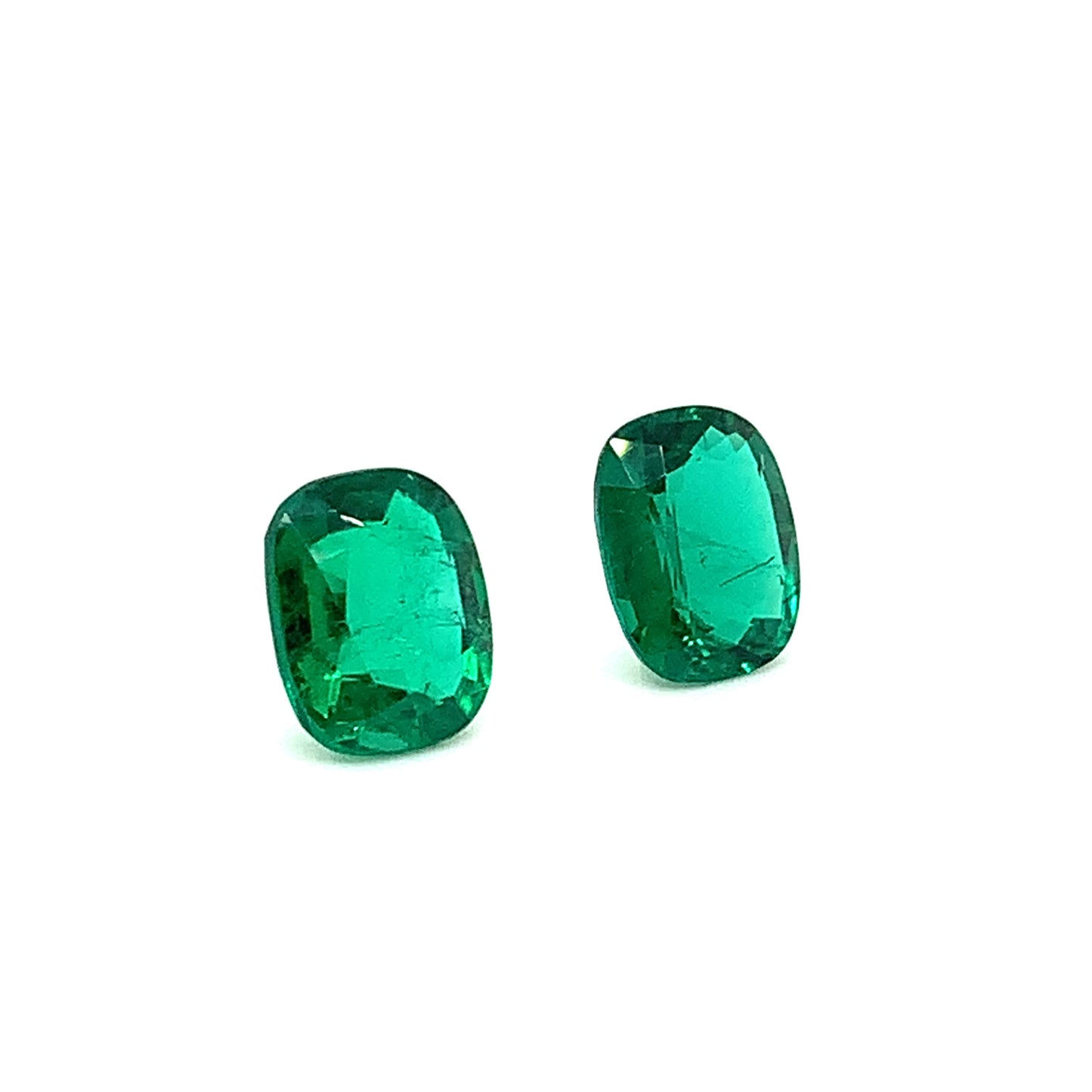 
                  
                    13.09x10.89x5.83mm Cushion Emerald Pair (2 pc 11.39 ct)
                  
                