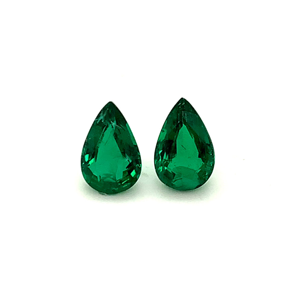 
                  
                    Load and play video in Gallery viewer, 12.25x8.15x5.03mm Pear-shaped Emerald Pair (2 pc 5.78 ct)
                  
                