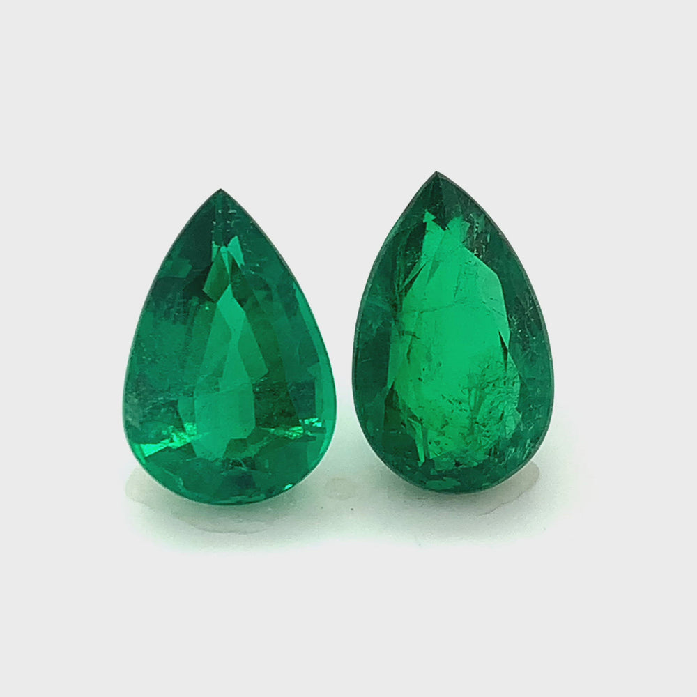 
                  
                    Load and play video in Gallery viewer, 18.31x12.32x7.82mm Pear-shaped Emerald Pair (2 pc 20.29 ct)
                  
                