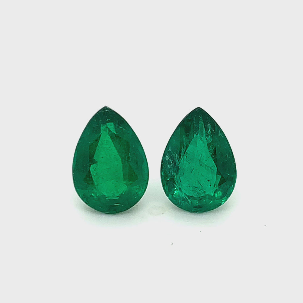 
                  
                    Load and play video in Gallery viewer, 12.17x8.62x5.32mm Pear-shaped Emerald (2 pc 6.25 ct)
                  
                