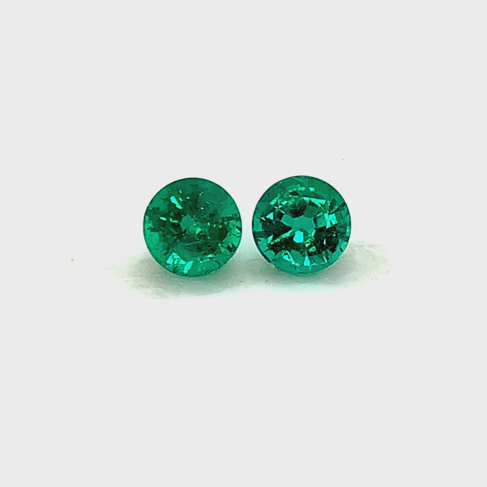
                  
                    Load and play video in Gallery viewer, 7.46x7.48x5.19mm Round Emerald (2 pc 3.36 ct)
                  
                