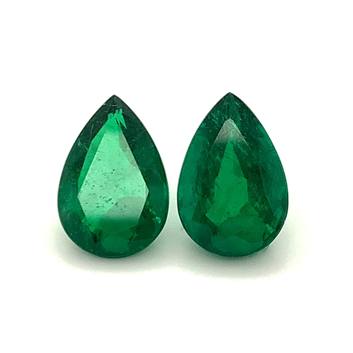 
                  
                    Load and play video in Gallery viewer, 15.86x10.69x7.30mm Pear-shaped Emerald Pair (2 pc 12.29 ct)
                  
                