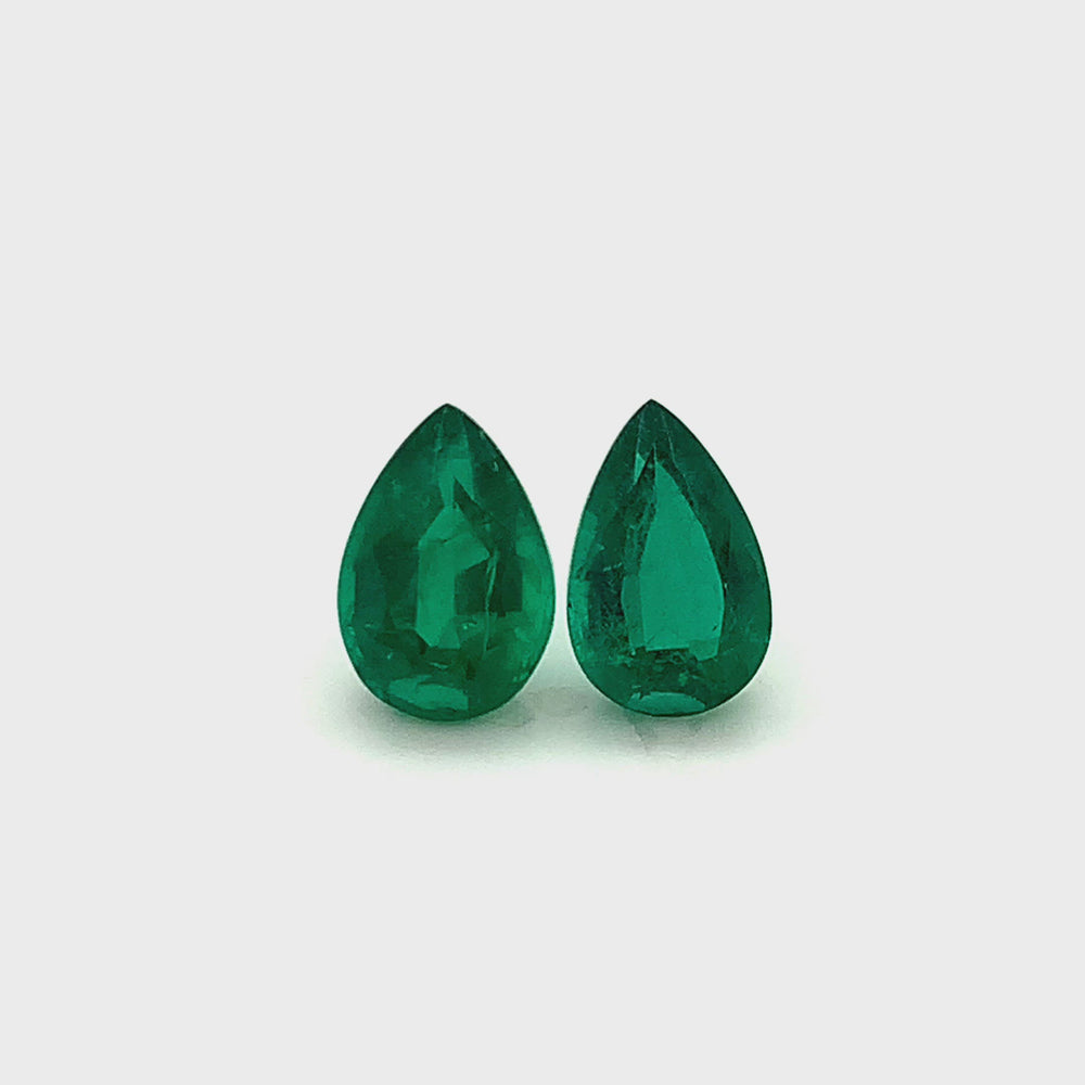 
                  
                    Load and play video in Gallery viewer, 11.00x7.10x0.00mm Pear-shaped Emerald (2 pc 4.83 ct)
                  
                