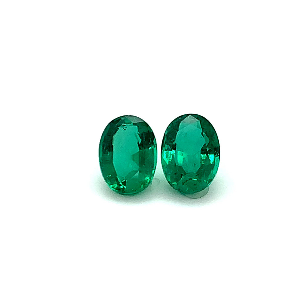 
                  
                    Load and play video in Gallery viewer, 10.45x7.68x5.53mm Oval Emerald Pair (2 pc 5.14 ct)
                  
                