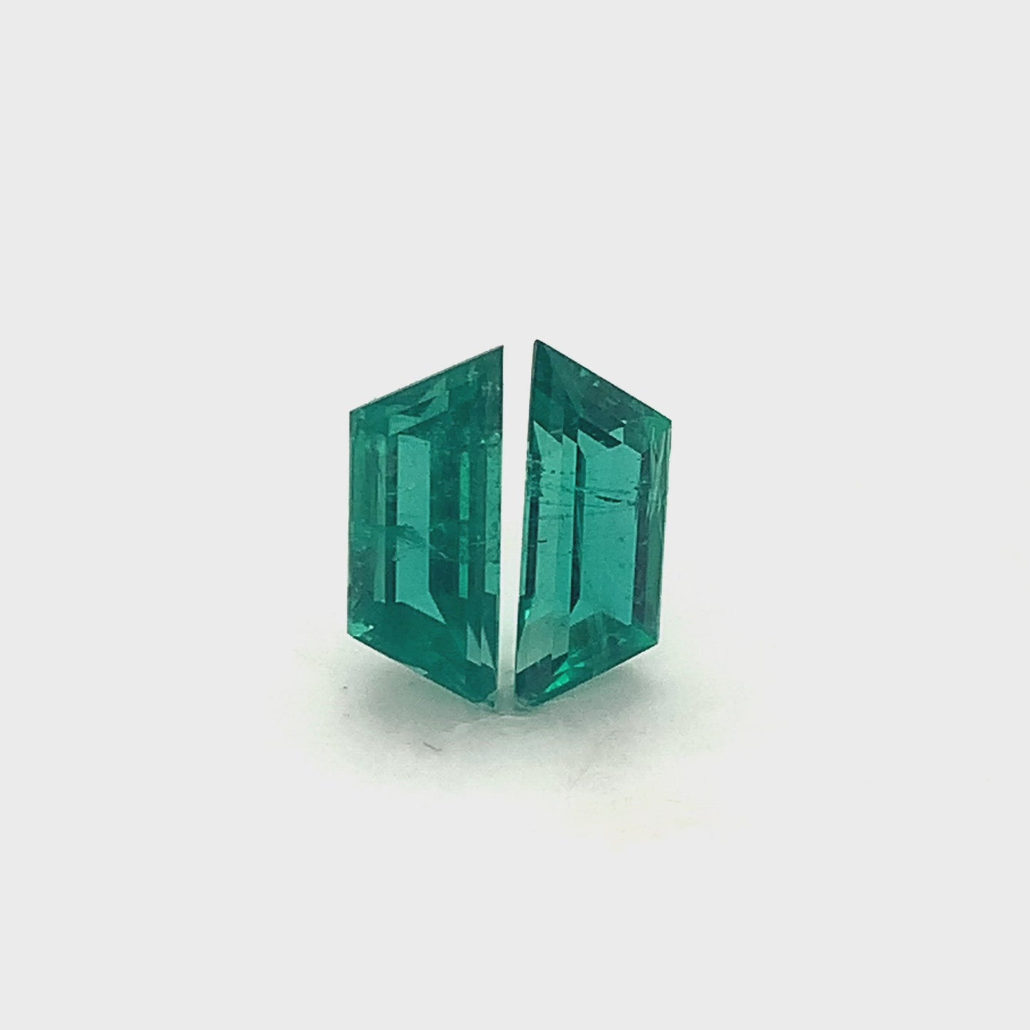 
                  
                    Load and play video in Gallery viewer, Fancy Cut Emerald (2 pc 4.50 ct)
                  
                