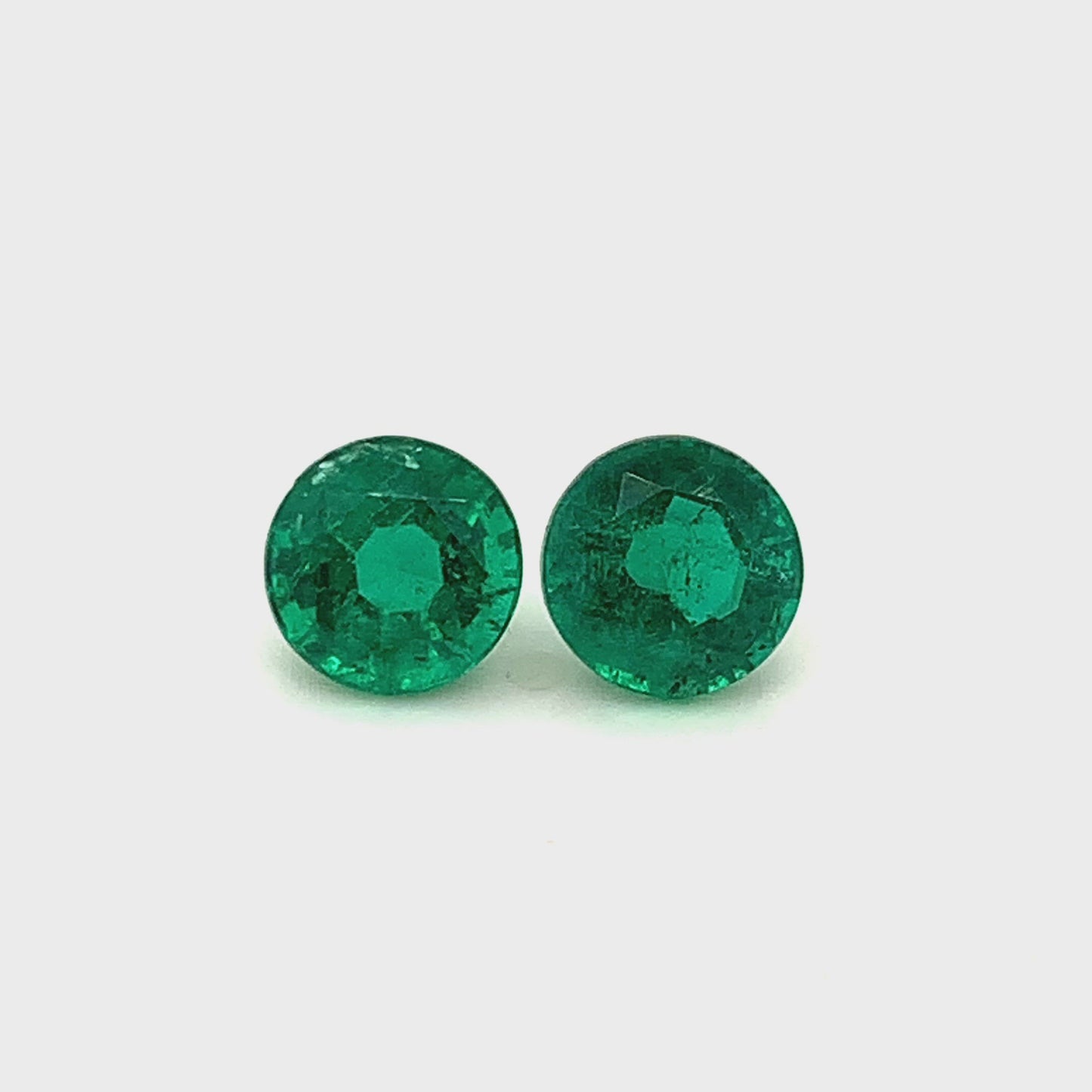 
                  
                    Load and play video in Gallery viewer, 7.76x7.84x5.49mm Round Emerald Pair (2 pc 3.89 ct)
                  
                