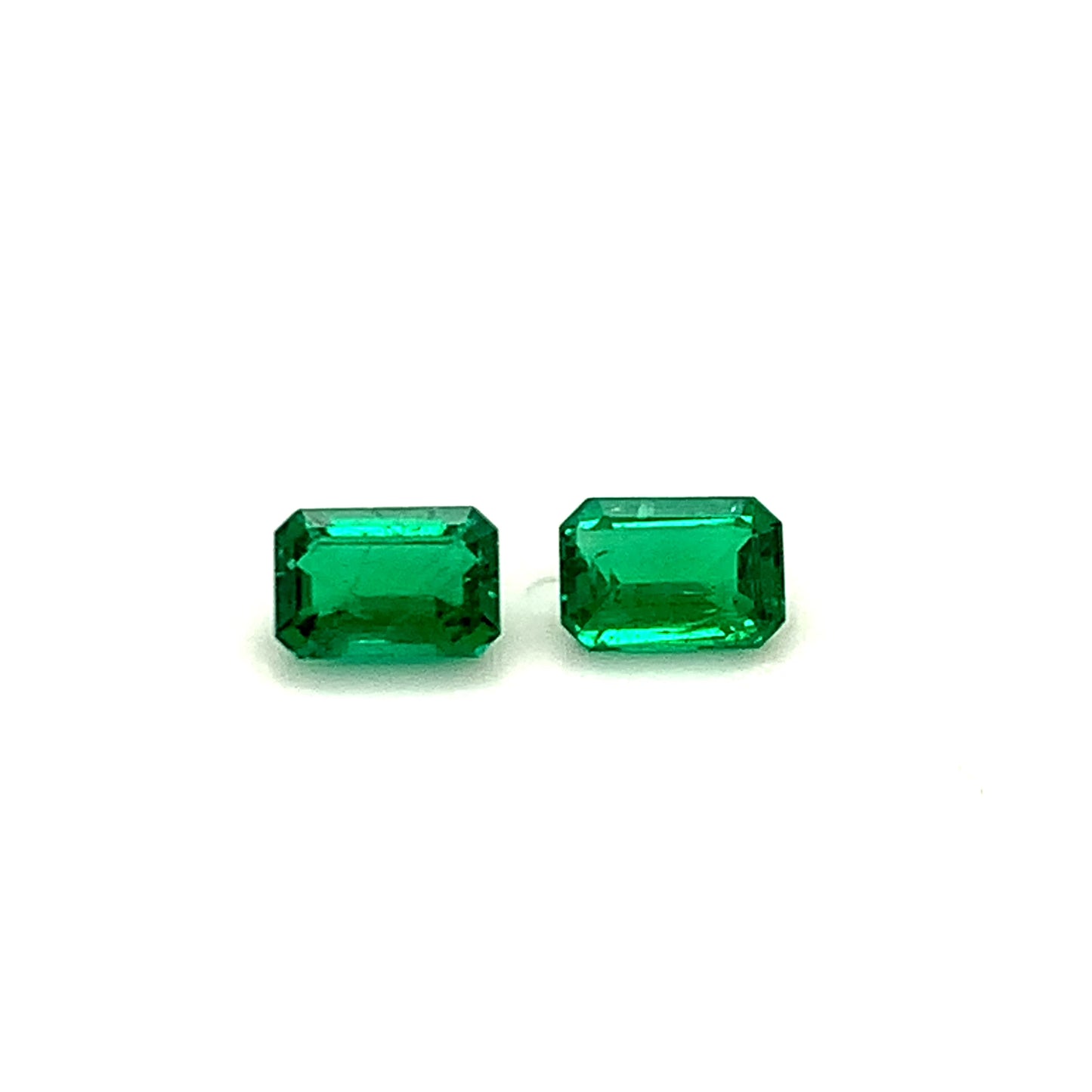 
                  
                    Load and play video in Gallery viewer, 7.25x4.90x3.41mm Octagon Emerald Pair (2 pc 1.78 ct)
                  
                