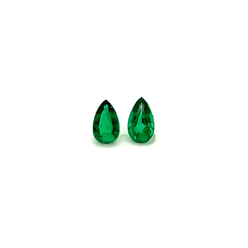 
                  
                    Load and play video in Gallery viewer, 8.70x5.10x0.00mm Pear-shaped Emerald (2 pc 1.56 ct)
                  
                