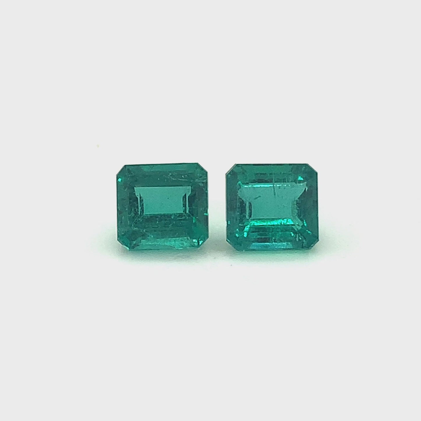 
                  
                    Load and play video in Gallery viewer, 8.44x7.99x5.25mm Octagon Emerald Pair (2 pc 5.60 ct)
                  
                