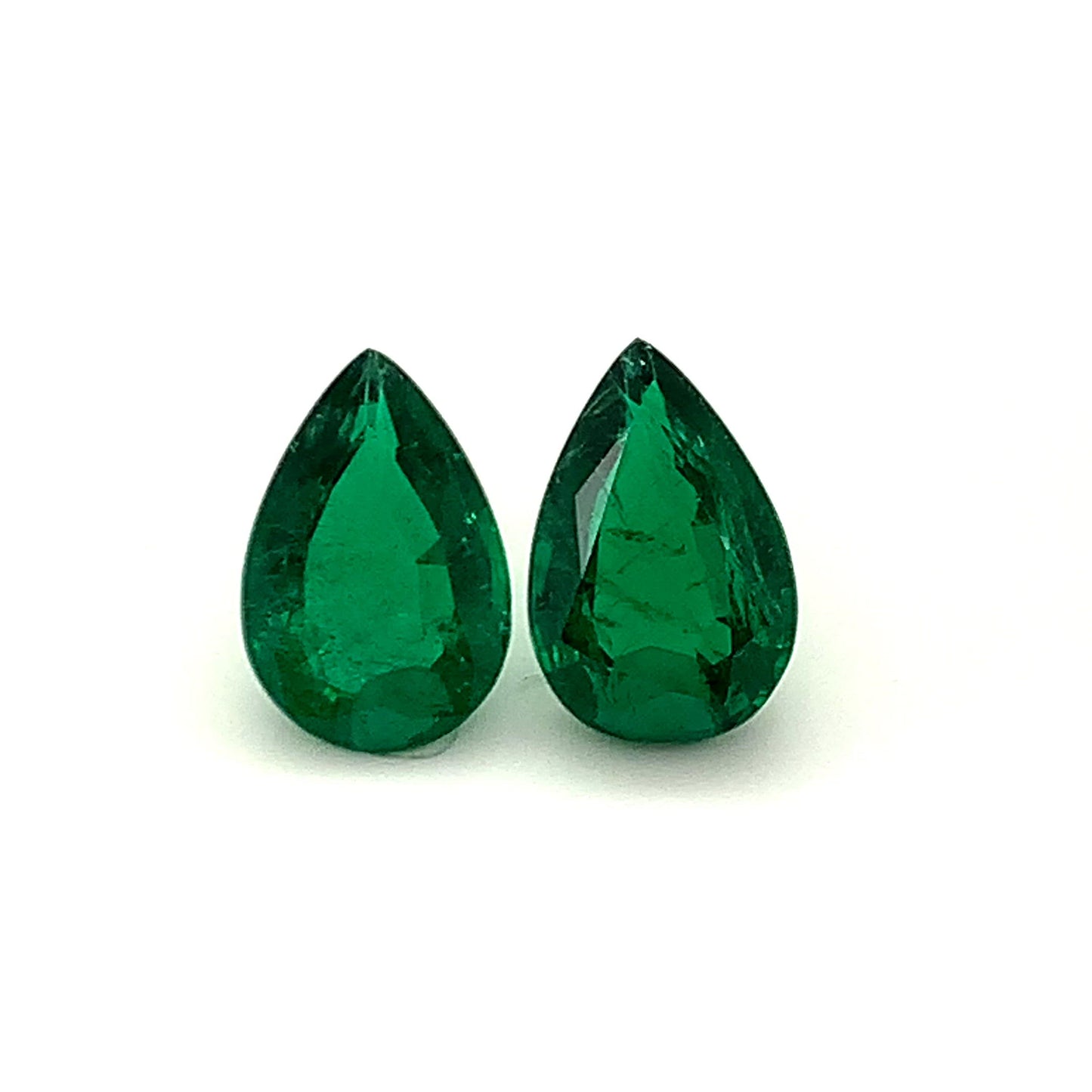 
                  
                    Load and play video in Gallery viewer, 14.54x9.66x5.79mm Pear-shaped Emerald Pair (2 pc 8.46 ct)
                  
                