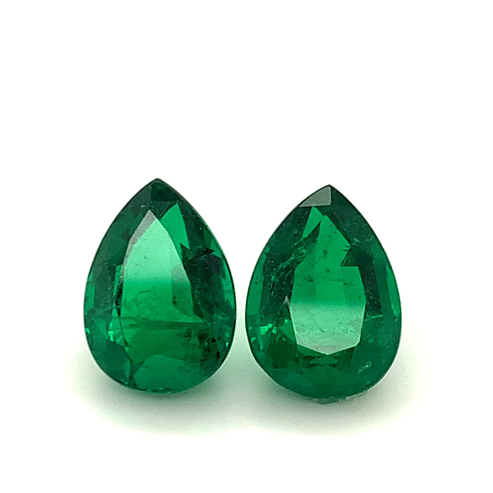 
                  
                    Load and play video in Gallery viewer, 14.46x10.54x7.36mm Pear-shaped Emerald Pair (2 pc 13.49 ct)
                  
                