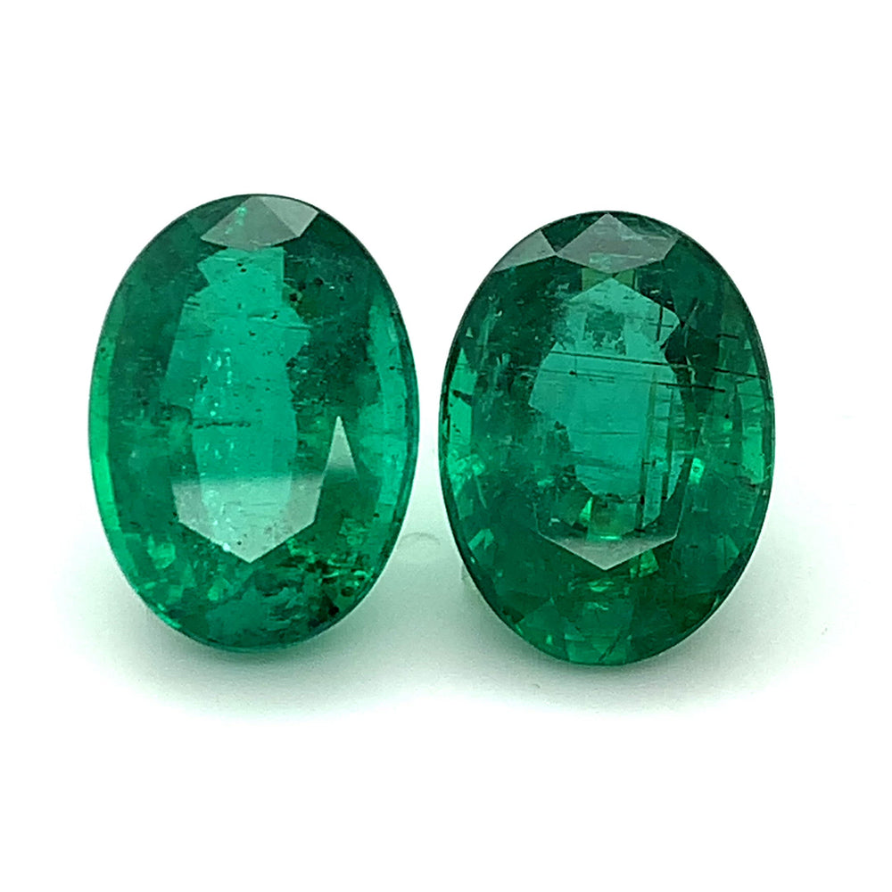 
                  
                    Load and play video in Gallery viewer, 20.02x14.36x9.68mm Oval Emerald Pair (2 pc 34.59 ct)
                  
                