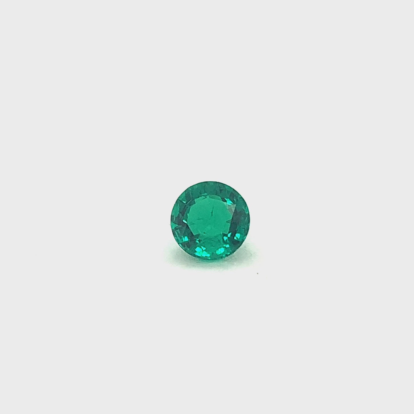 
                  
                    Load and play video in Gallery viewer, 7.15x7.16x4.35mm Round Emerald (1 pc 1.28 ct)
                  
                