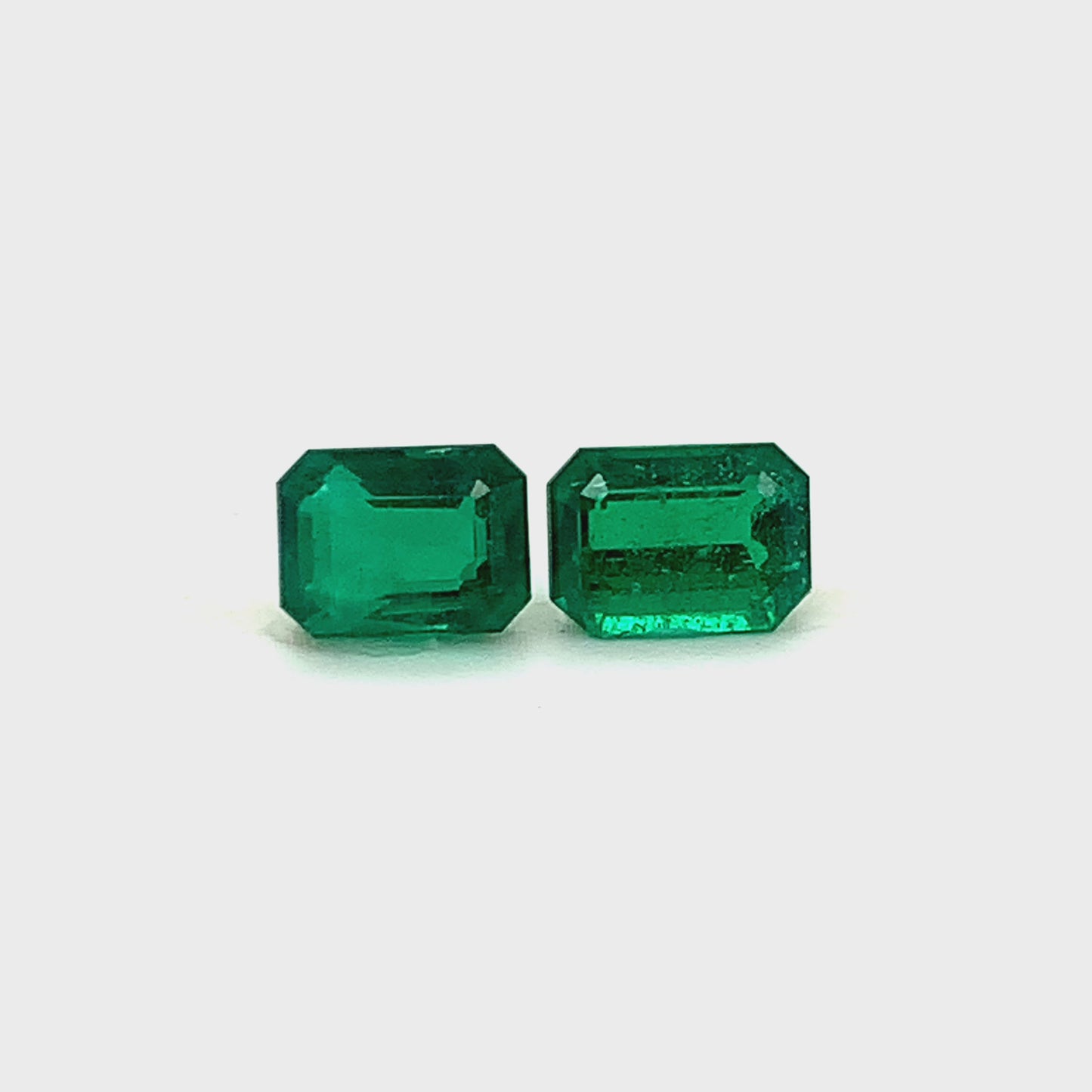 
                  
                    Load and play video in Gallery viewer, 9.61x7.25x5.38mm Octagon Emerald Pair (2 pc 5.82 ct)
                  
                