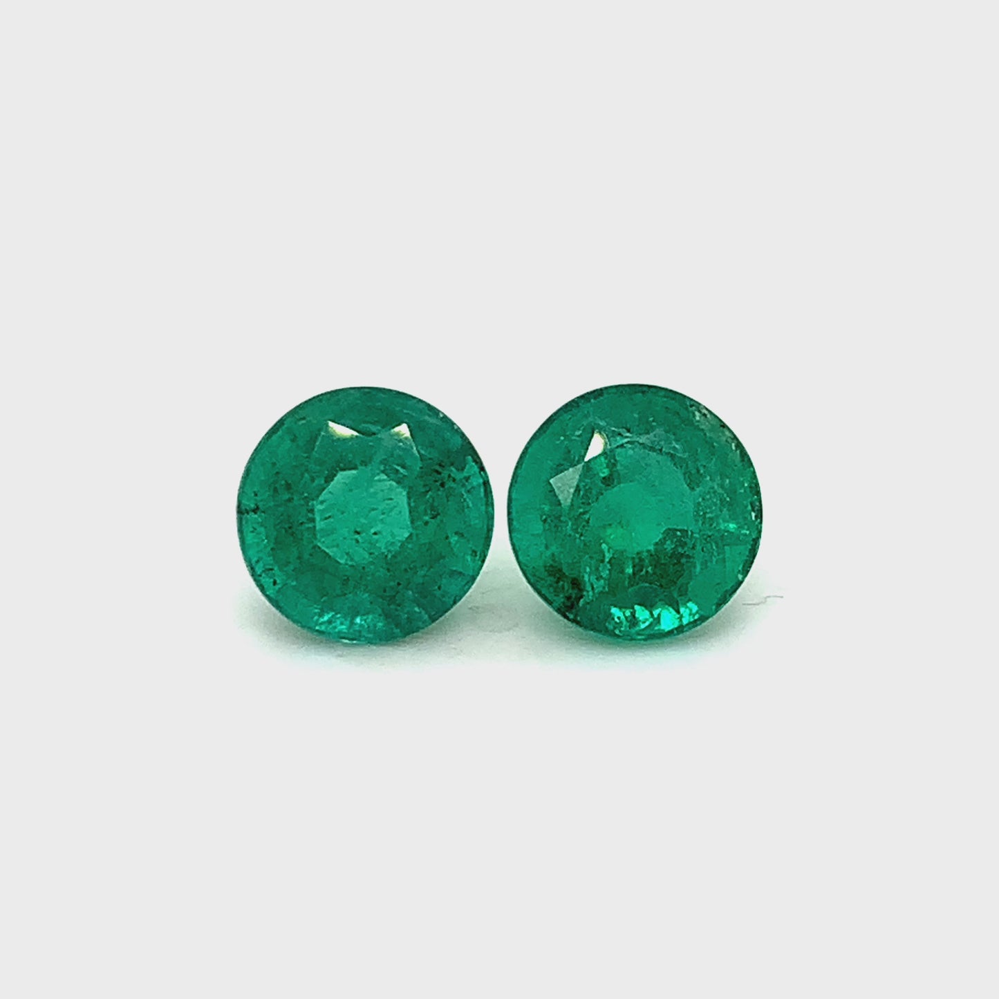 9.50x0.00x0.00mm Round Emerald (2 pc 6.68 ct)